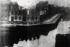 Buildings on Morrison's Island undergoing demolition in 1935 to make way for the new School of Commerce. Image from the Cork Examiner.